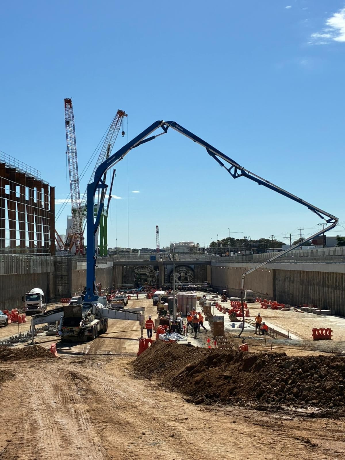 Boom placing into a basement pour