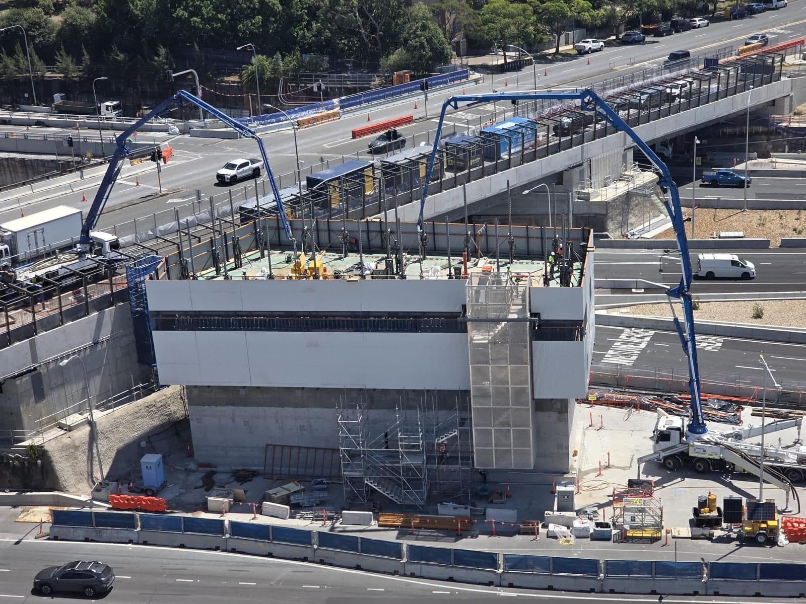 Booms placing on a freeway job