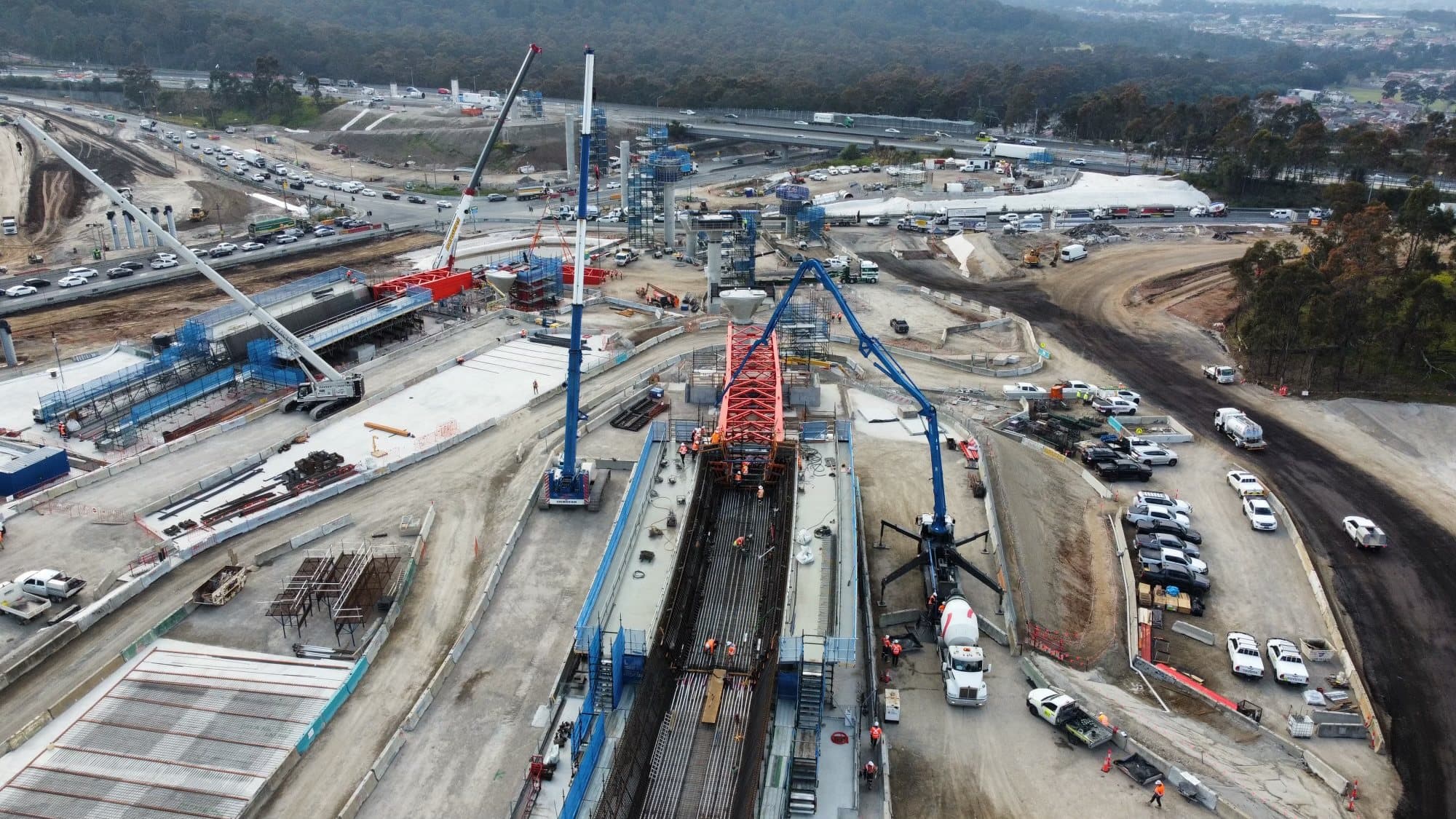 Two booms placing on a major road project